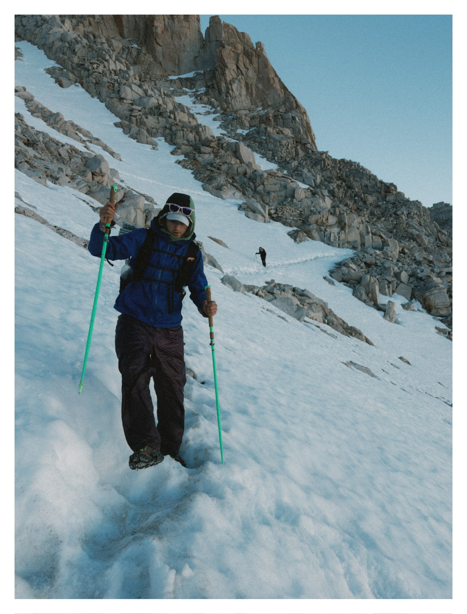 eigen hiking down a snowy slope